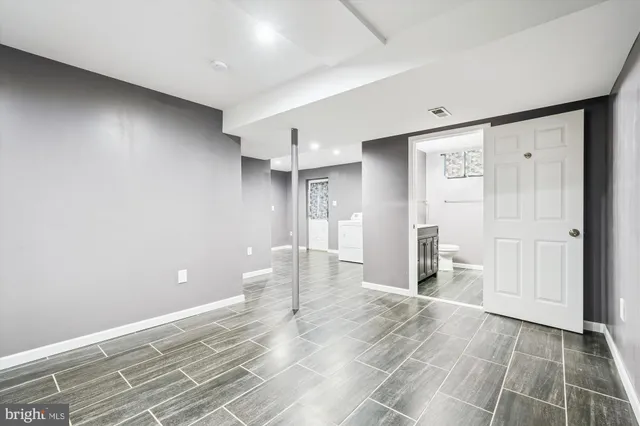 a view of a livingroom with wooden floor