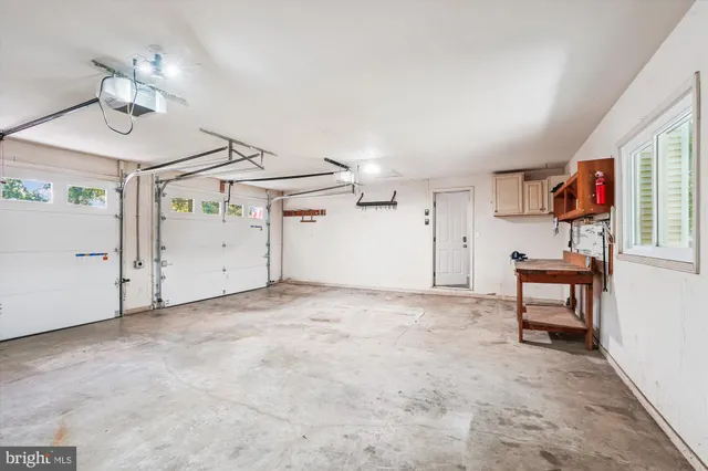 a view of a livingroom with furniture and windows