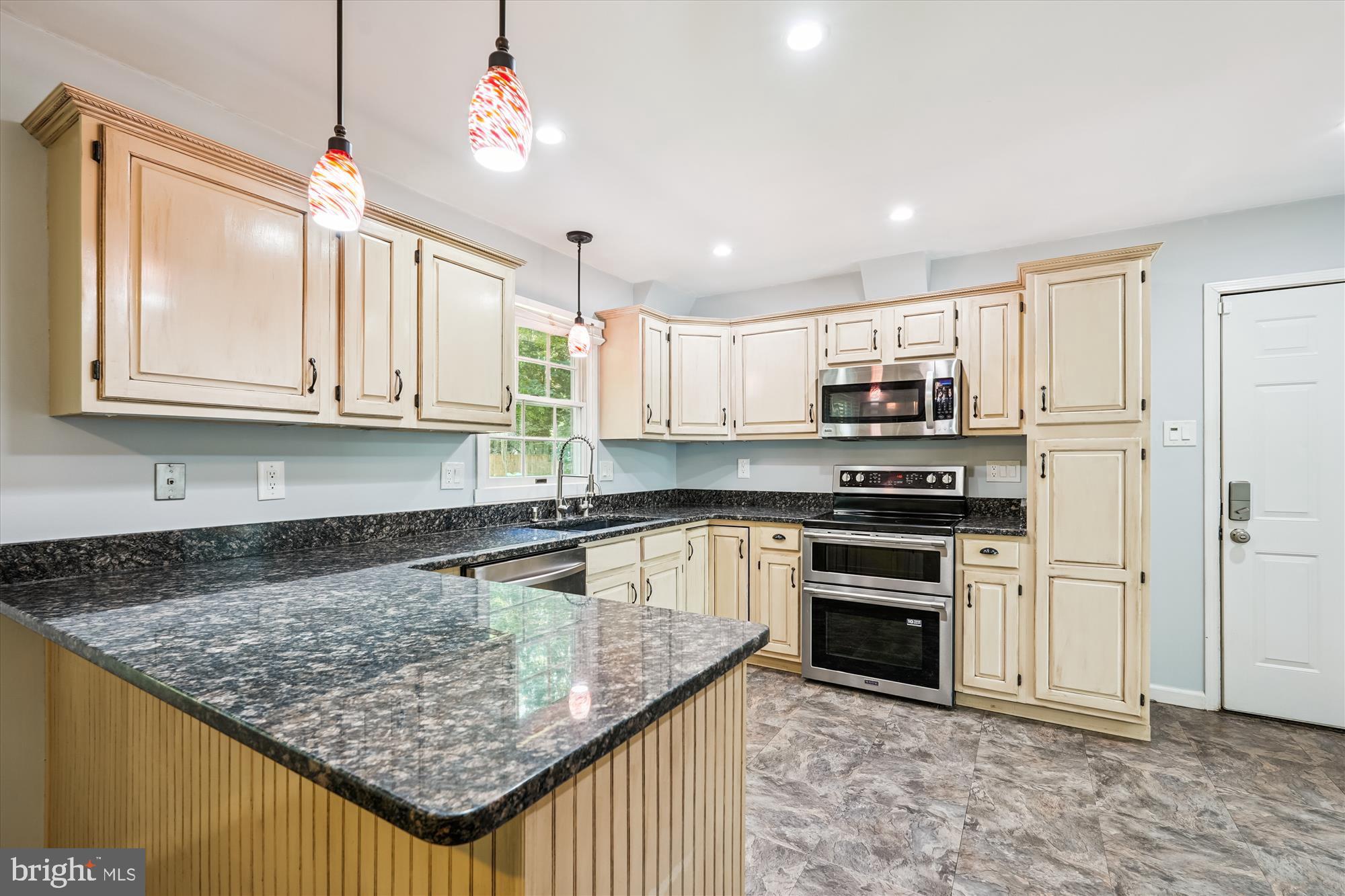 15418 Peach Orchard Road Silver Spring, MD 20905 - Photo 4 of 47 Modern kitchen with elegant finishes.