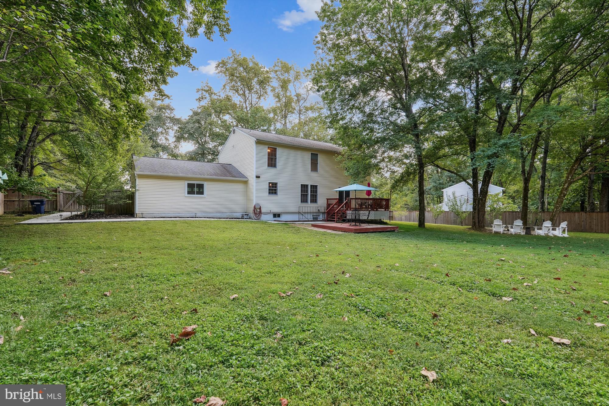 15418 Peach Orchard Road Silver Spring, MD 20905 - Photo 43 of 47 Serene backyard retreat with lush greenery.