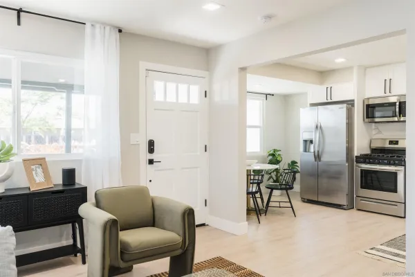 a living room with furniture and a window