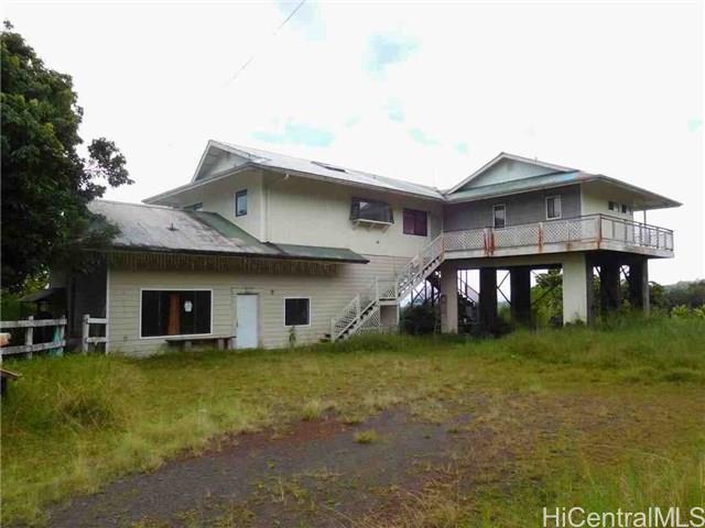 2679 Kaiwiki Road Hilo, HI 96720 - Photo 1 of 1 a house view with a garden space