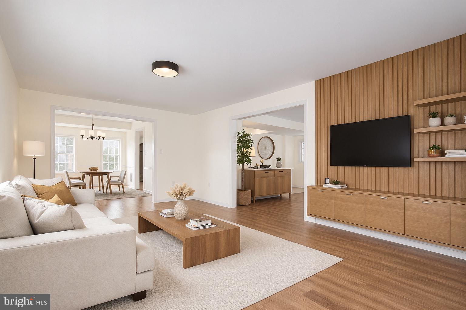 13511 Chevy Chase Court Chantilly, VA 20151 - Photo 12 of 57 a living room with furniture and a flat screen tv