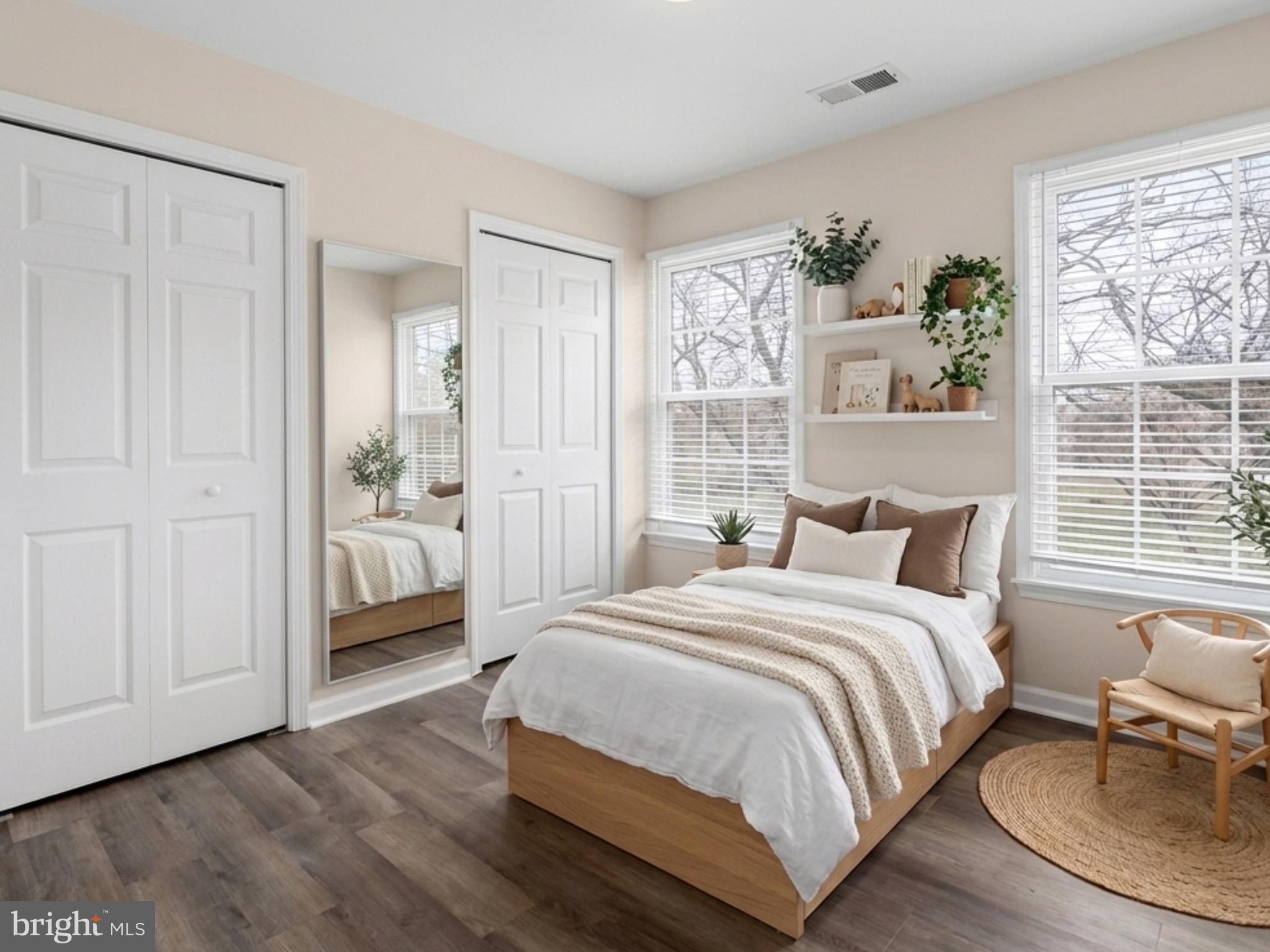 13511 Chevy Chase Court Chantilly, VA 20151 - Photo 27 of 57 a bedroom with a bed wooden floor and window