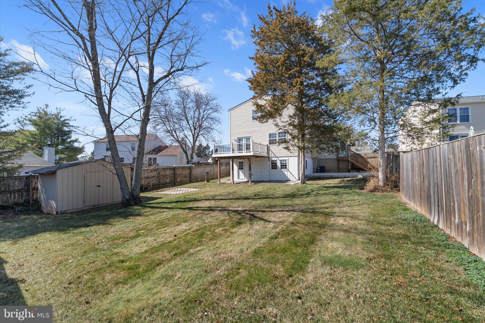 13511 Chevy Chase Court Chantilly, VA 20151 - Photo 45 of 57 a view of a house with a yard