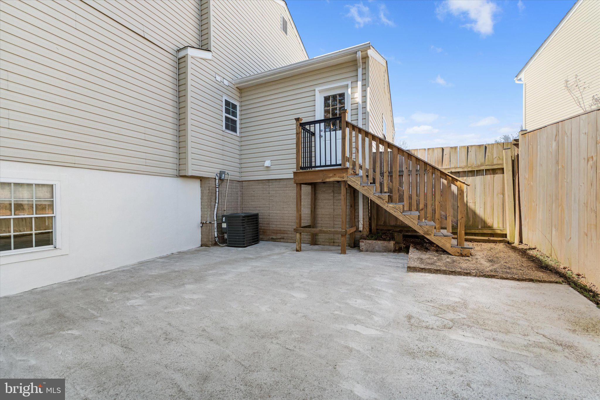 13511 Chevy Chase Court Chantilly, VA 20151 - Photo 46 of 57 a view of an house with stairs and a yard