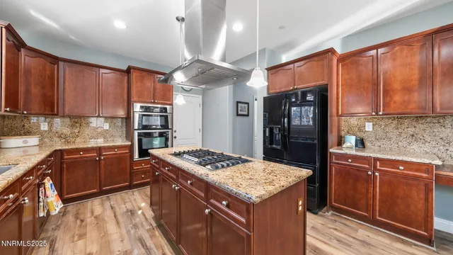 an aerial view of house with yard