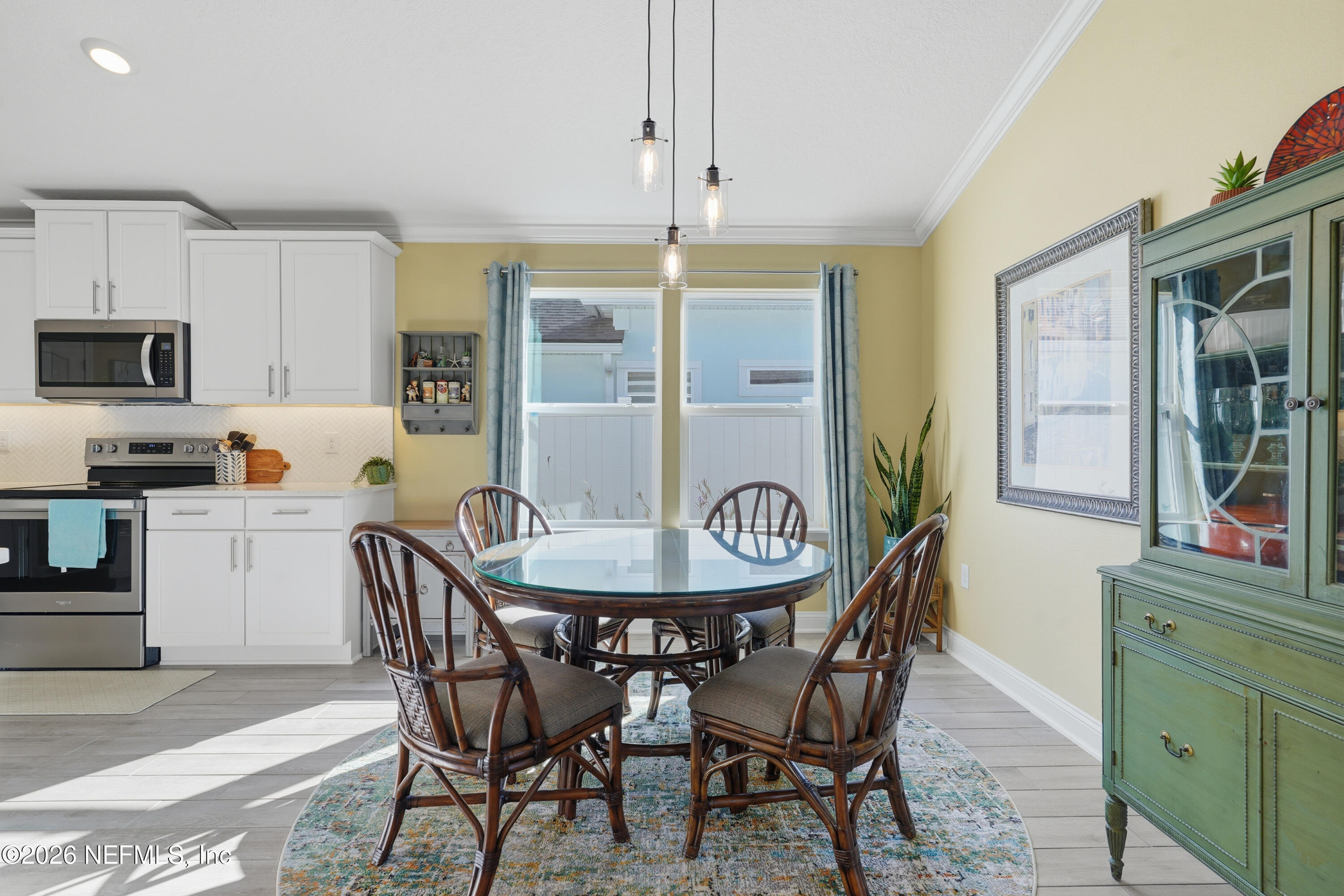71 Gypsum Pl Street St. Augustine, FL 32086 - Photo 16 of 42 a view of a dining room with furniture