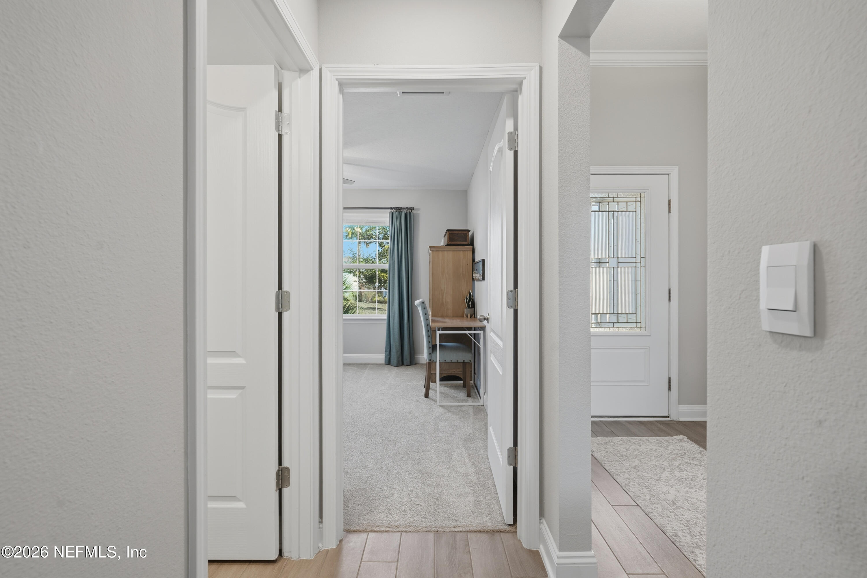71 Gypsum Pl Street St. Augustine, FL 32086 - Photo 23 of 42 a view of a livingroom from a hallway