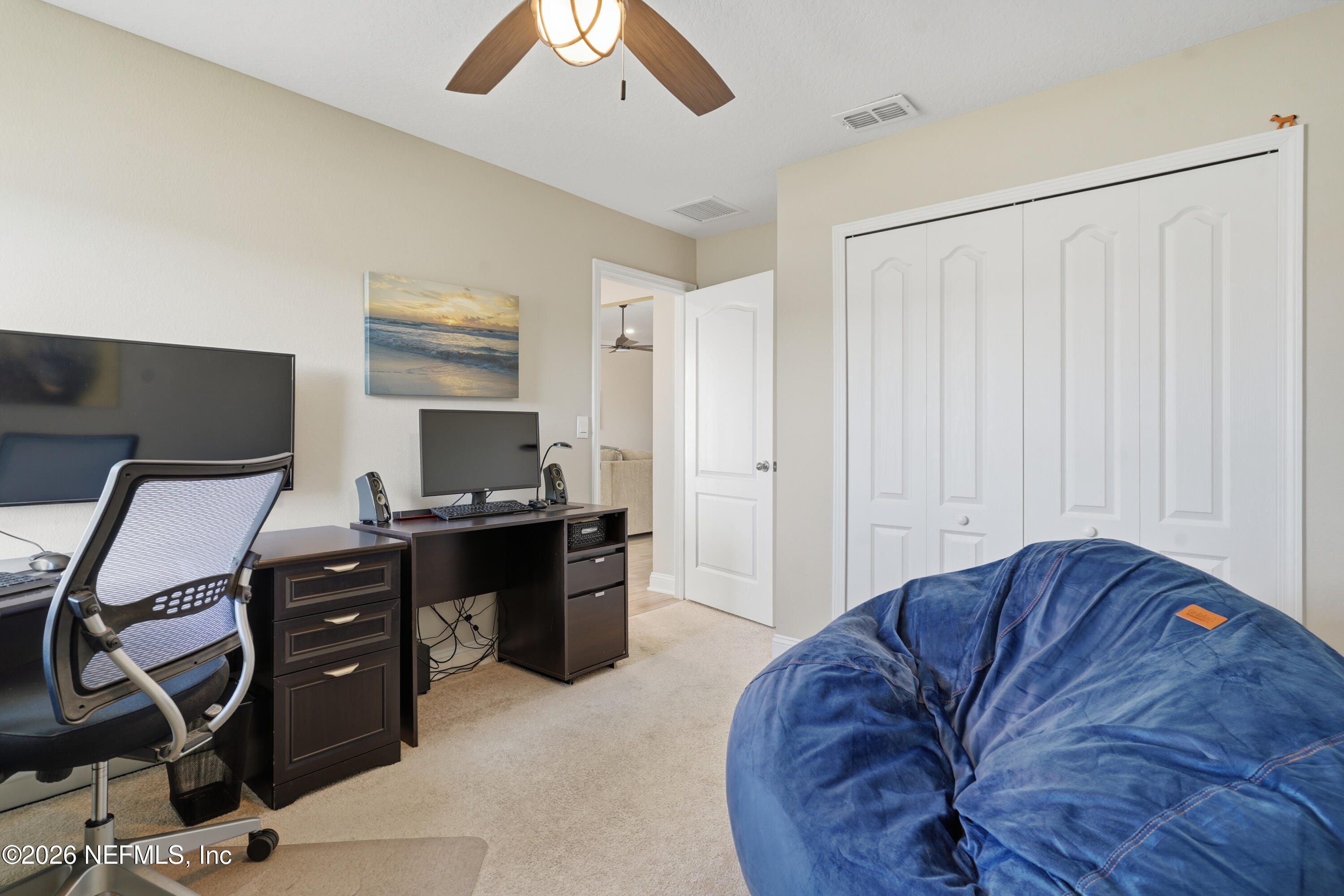 71 Gypsum Pl Street St. Augustine, FL 32086 - Photo 25 of 42 a living room with furniture a air conditioner and a window
