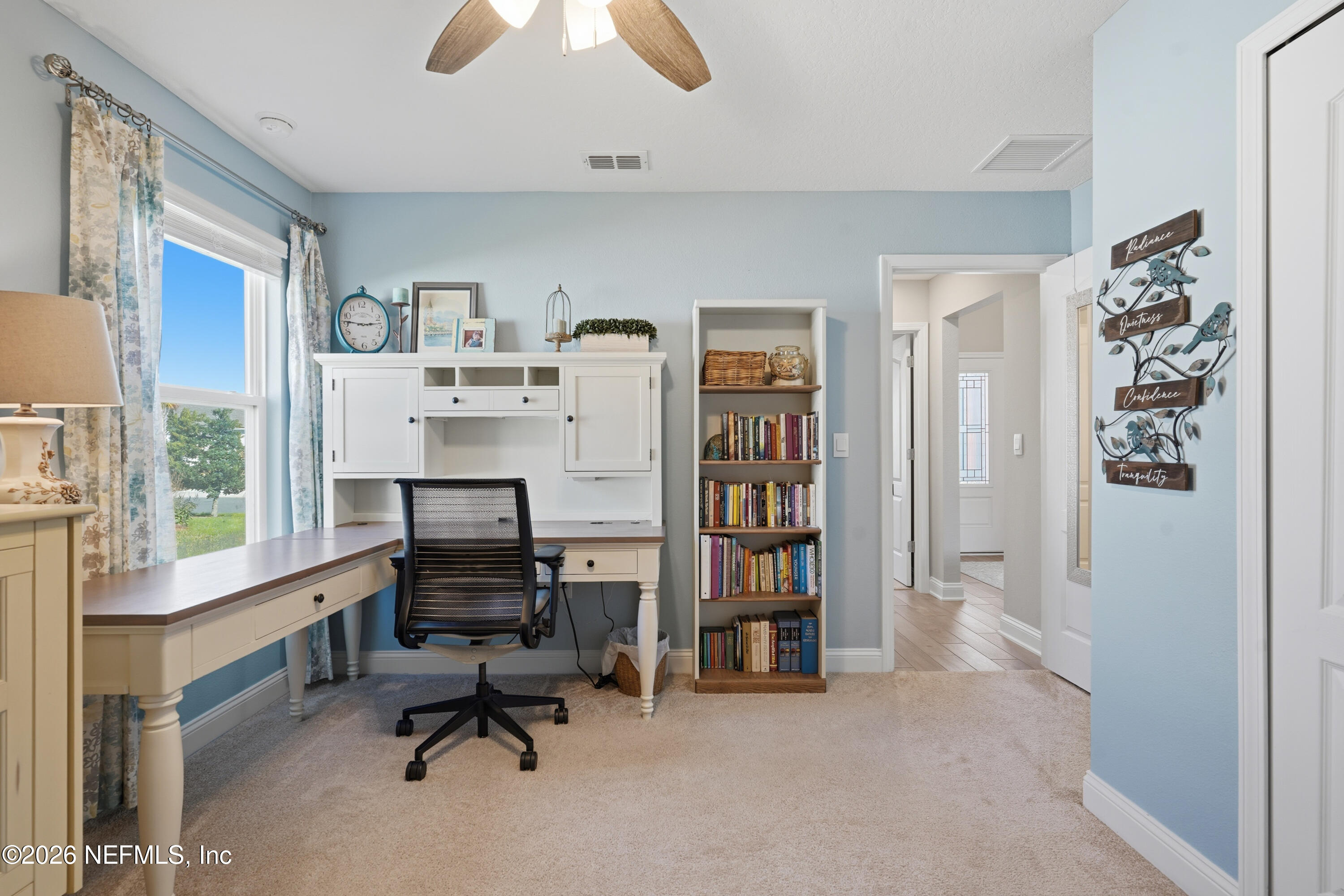 71 Gypsum Pl Street St. Augustine, FL 32086 - Photo 30 of 42 a view of a workspace with furniture and a window
