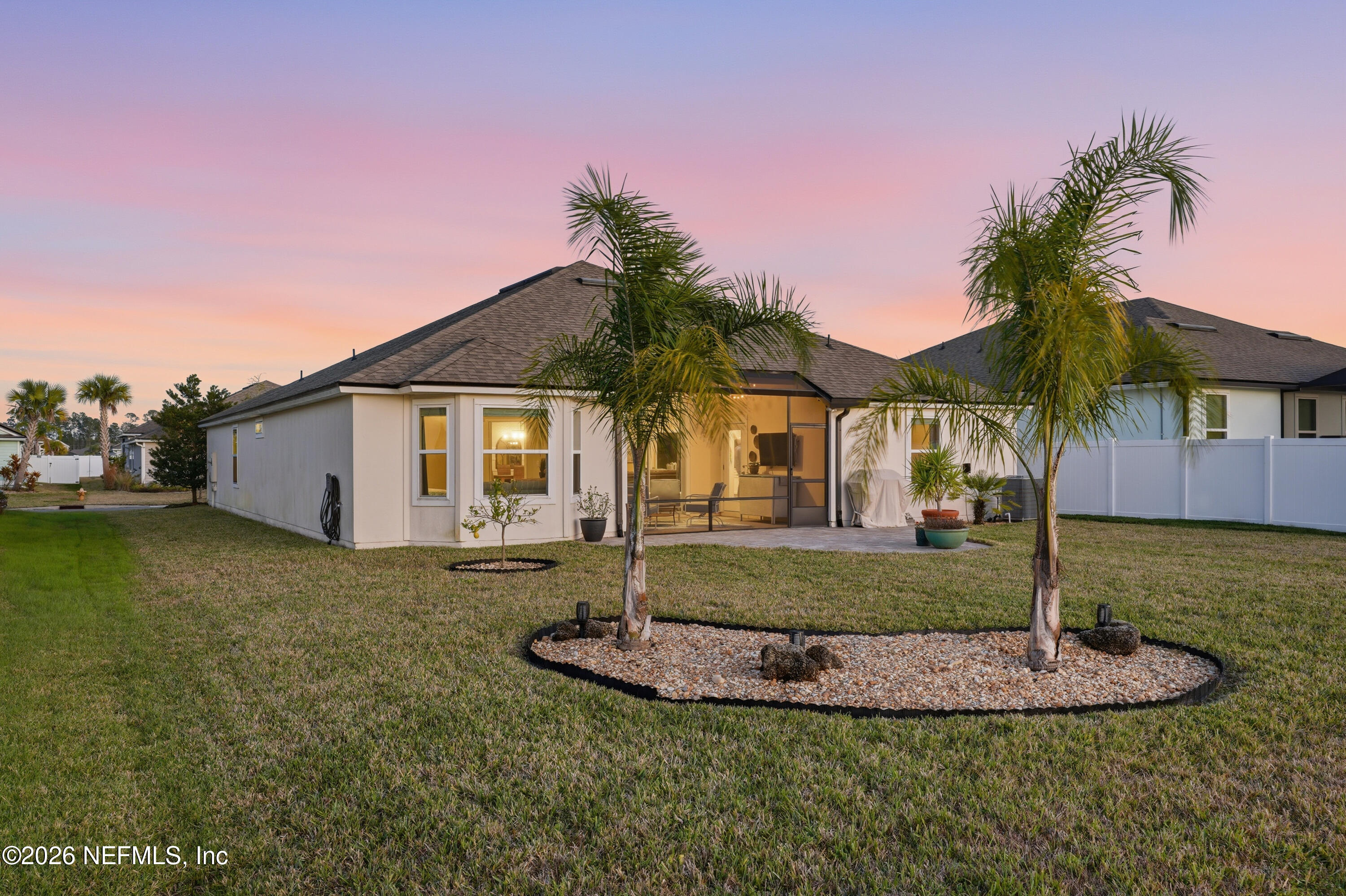 71 Gypsum Pl Street St. Augustine, FL 32086 - Photo 37 of 42 a view of a house with a yard and garage