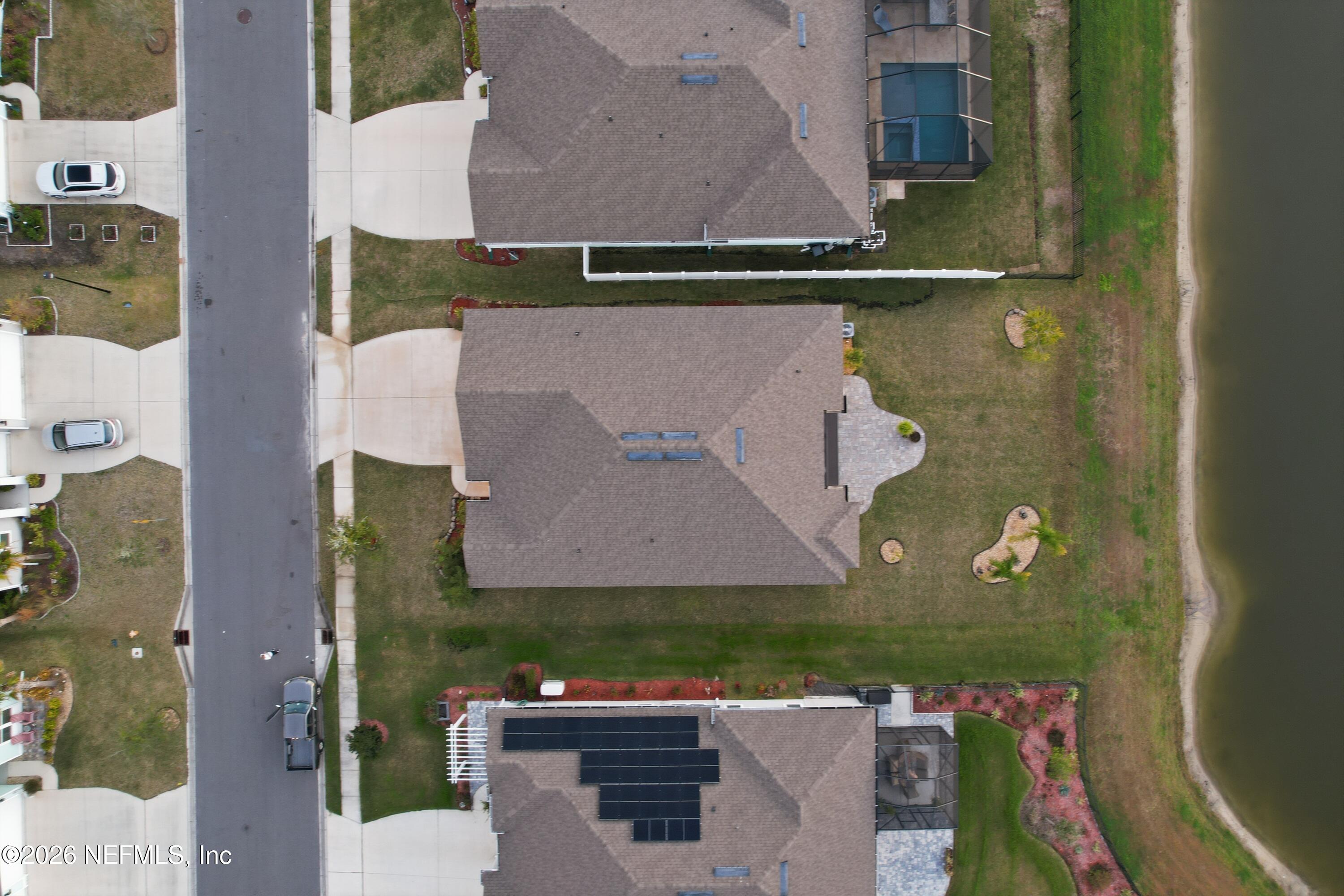 71 Gypsum Pl Street St. Augustine, FL 32086 - Photo 5 of 42 an aerial view of a house with a lake view
