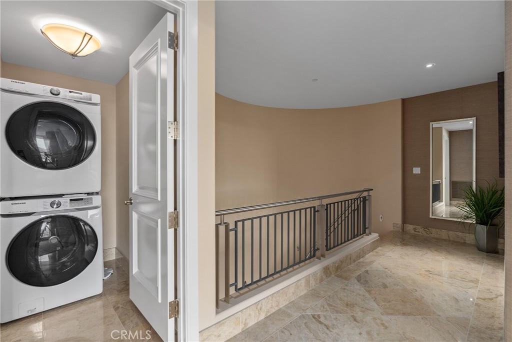 5153 Scholarship Irvine, CA 92612 - Photo 15 of 45 a view of a hallway with washer and dryer