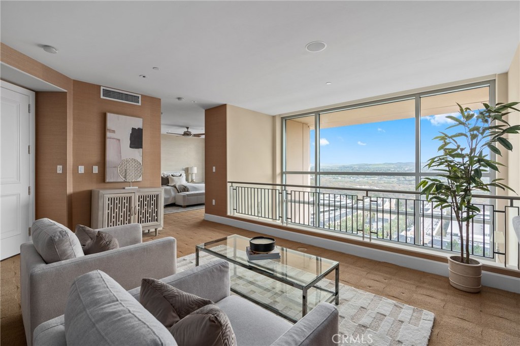 5153 Scholarship Irvine, CA 92612 - Photo 18 of 45 a living room with furniture and a large window