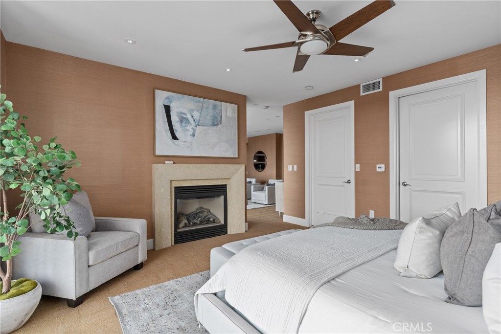 5153 Scholarship Irvine, CA 92612 - Photo 22 of 45 a bedroom with a bed and a couch