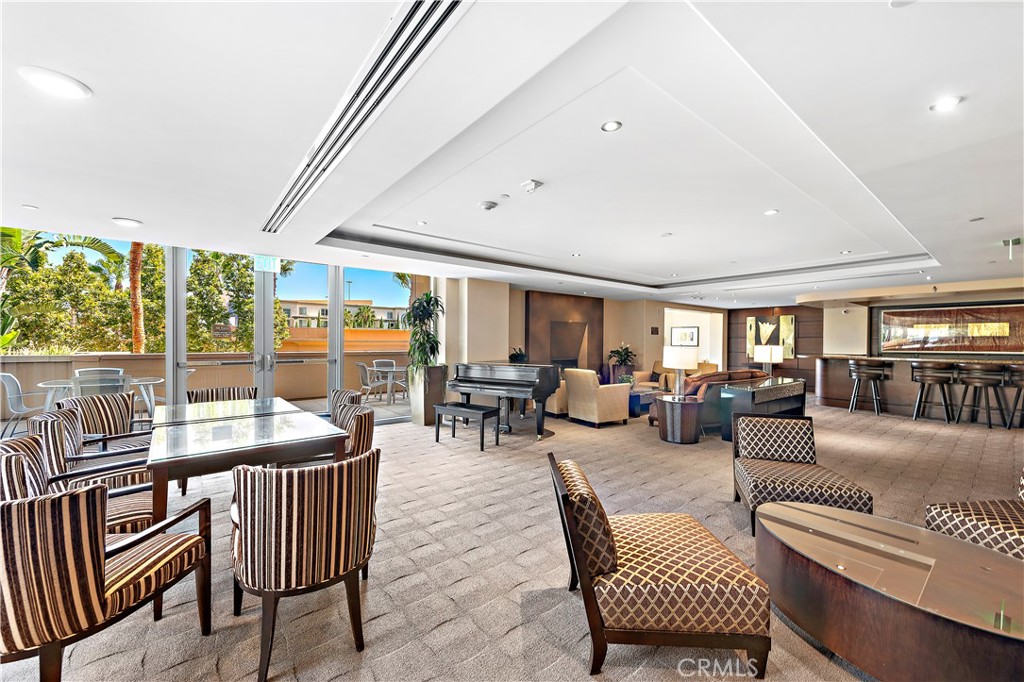 5153 Scholarship Irvine, CA 92612 - Photo 24 of 45 a living room with furniture and large windows