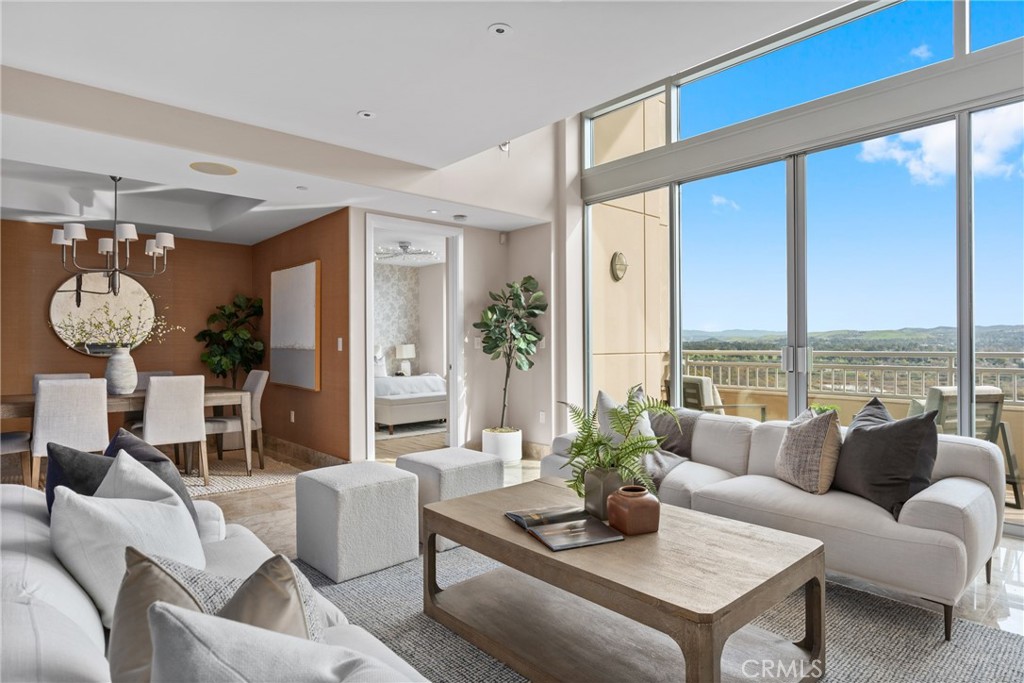 5153 Scholarship Irvine, CA 92612 - Photo 3 of 45 a living room with furniture and a large window