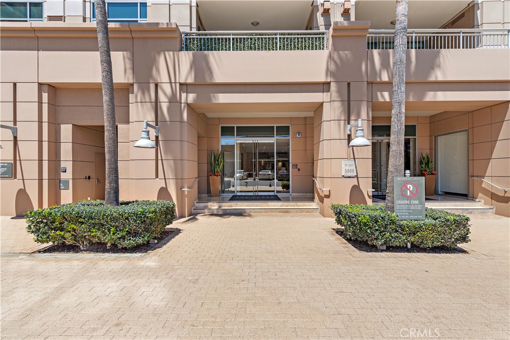 5153 Scholarship Irvine, CA 92612 - Photo 42 of 45 a view of a building with a potted plant ana a small yard