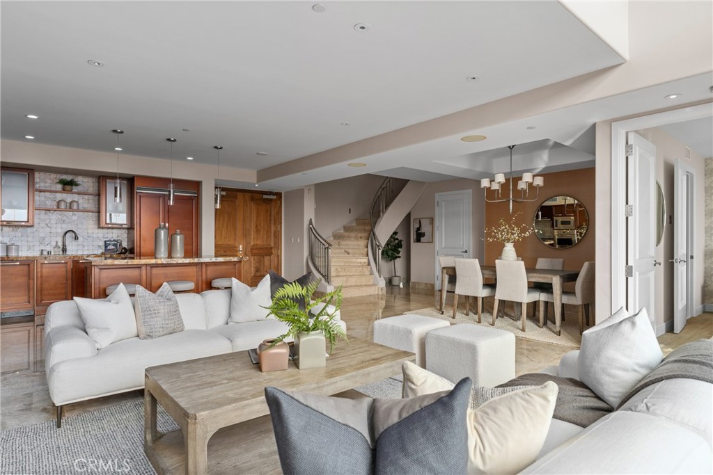 5153 Scholarship Irvine, CA 92612 - Photo 5 of 45 a living room with furniture and a large window