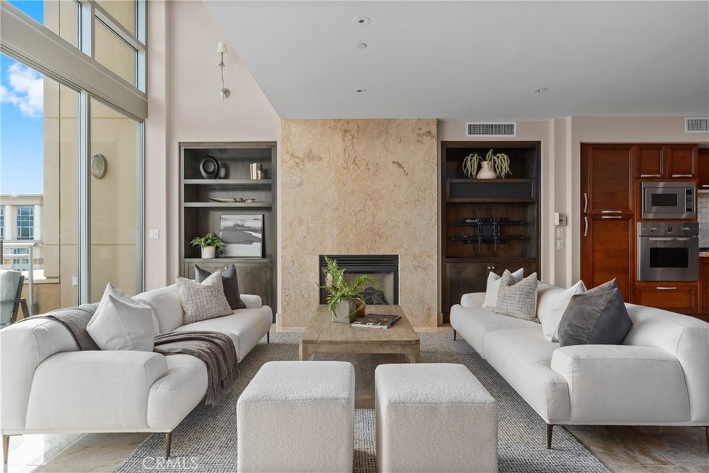 5153 Scholarship Irvine, CA 92612 - Photo 8 of 45 a living room with furniture and a fireplace