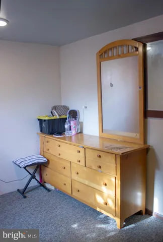 a view of room with cabinet