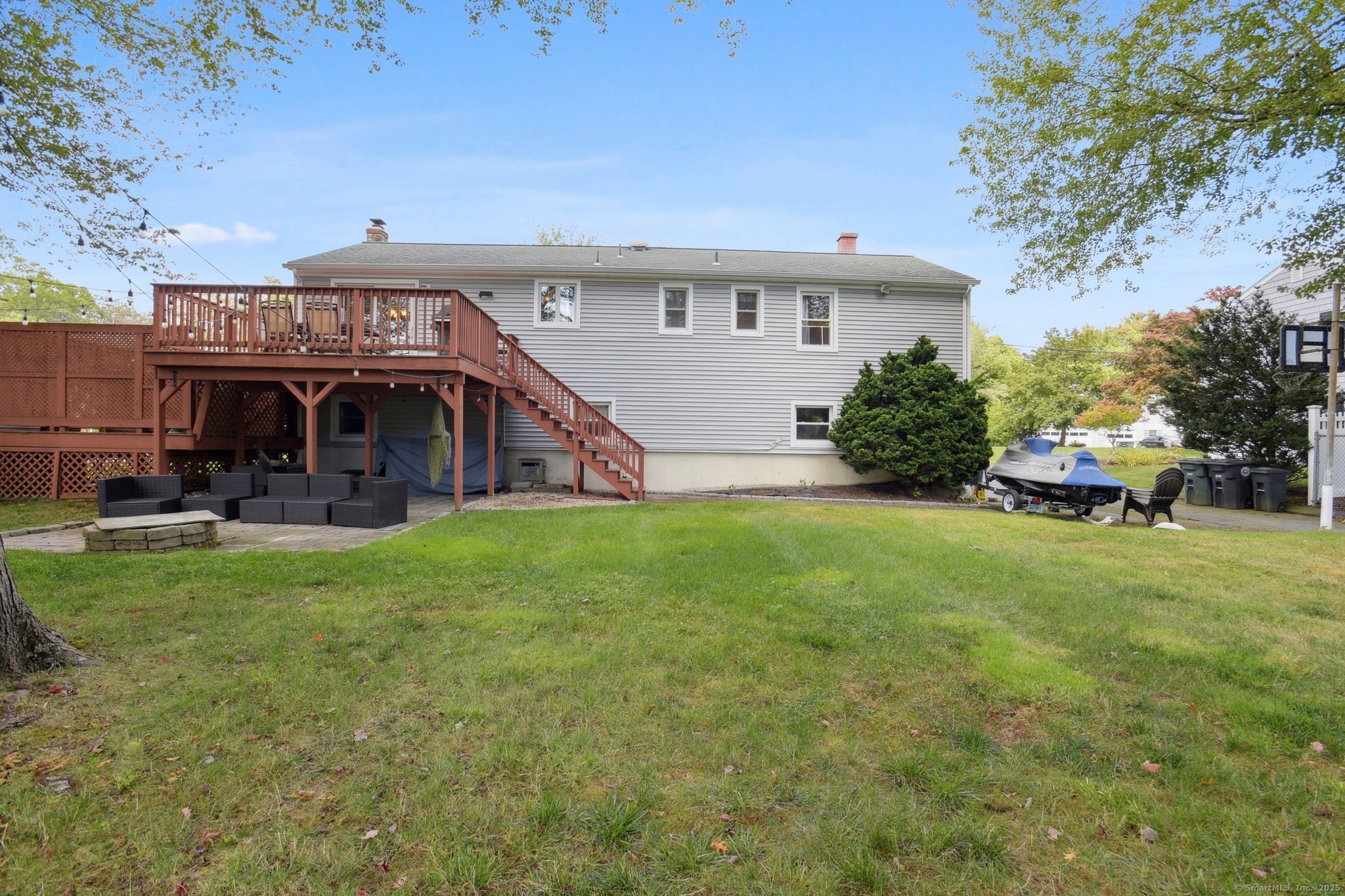 25 Carmen Road Milford, CT 06460 - Photo 15 of 21 a view of a house with a yard porch and sitting area