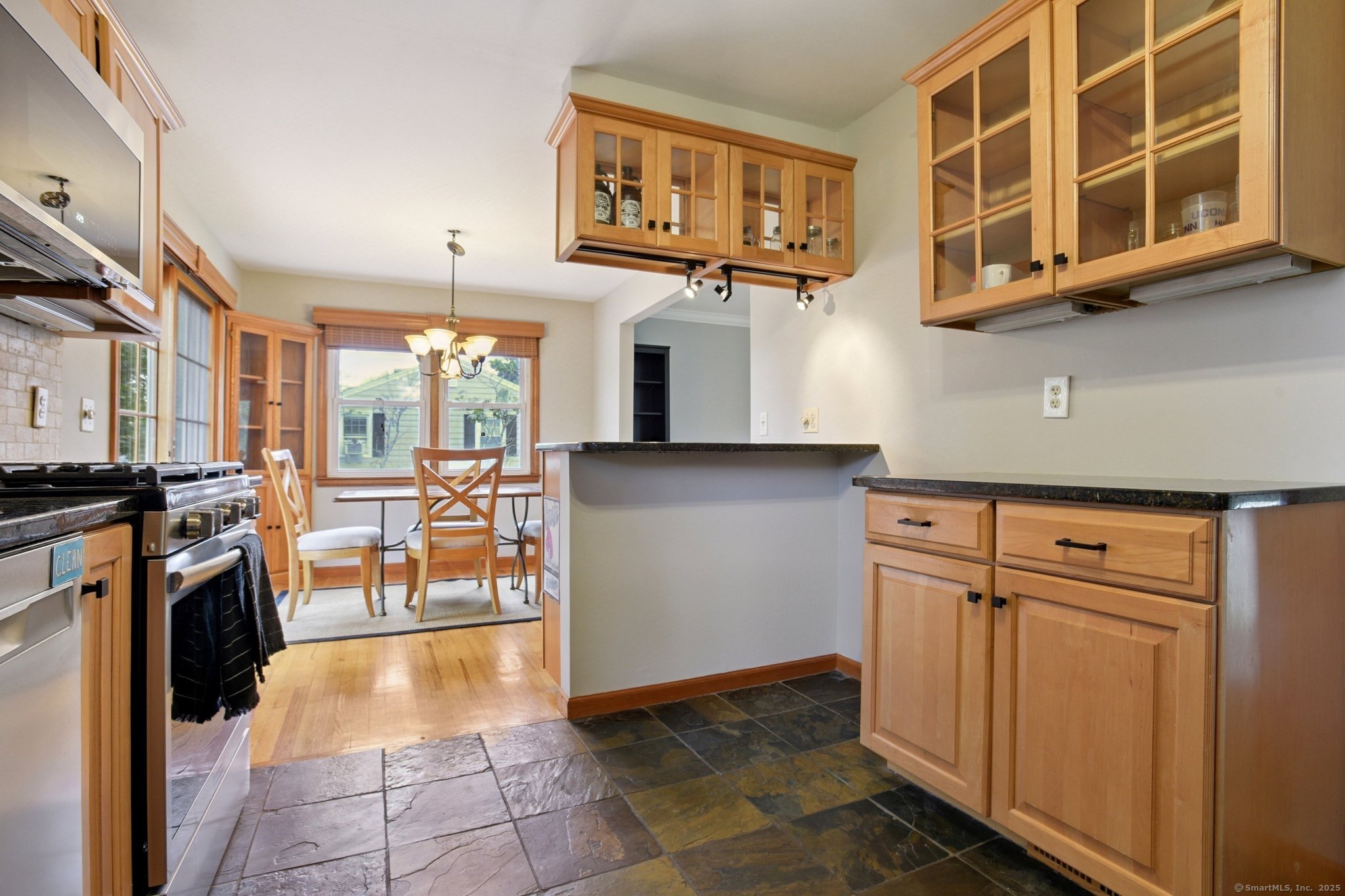 25 Carmen Road Milford, CT 06460 - Photo 5 of 21 a view of a kitchen with a sink and cabinets