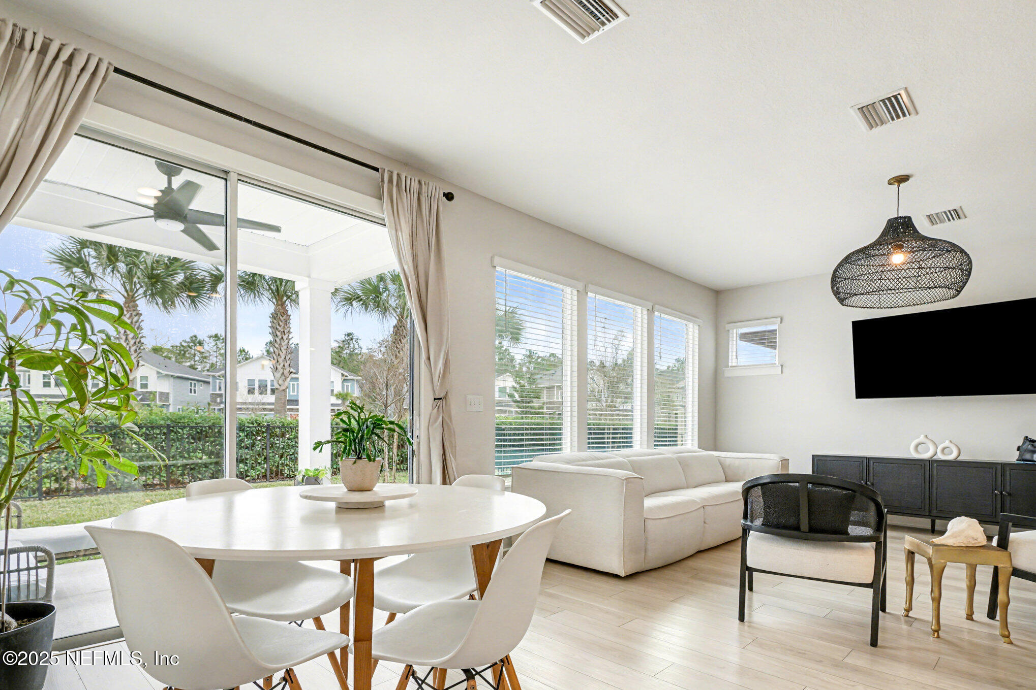 9858 Element Road Jacksonville, FL 32256 - Photo 4 of 19 a living room with furniture and a large window