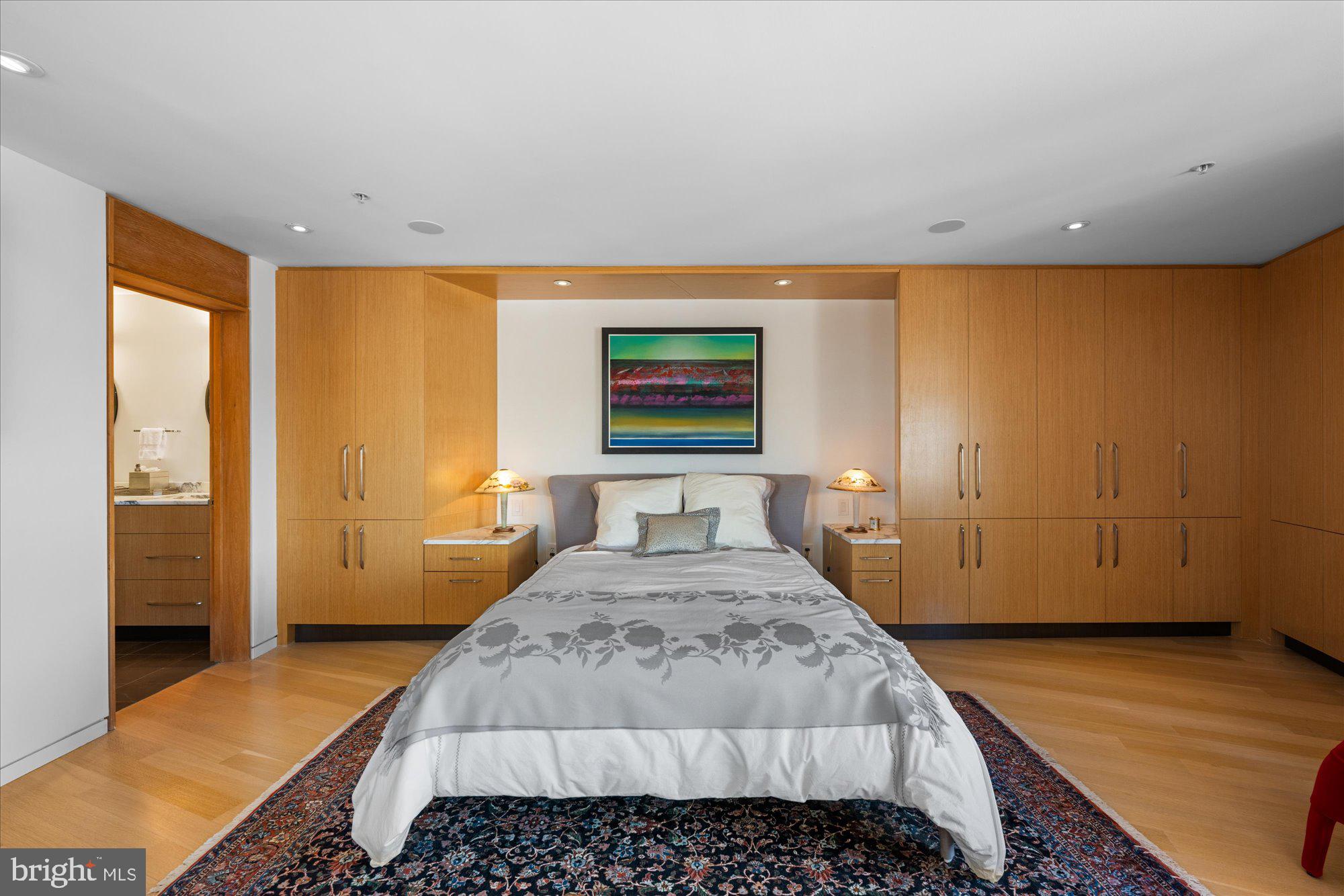 4750 41st Street Northwest, Unit 507 Washington, DC 20016 - Photo 28 of 55 a bedroom with a large bed and a window