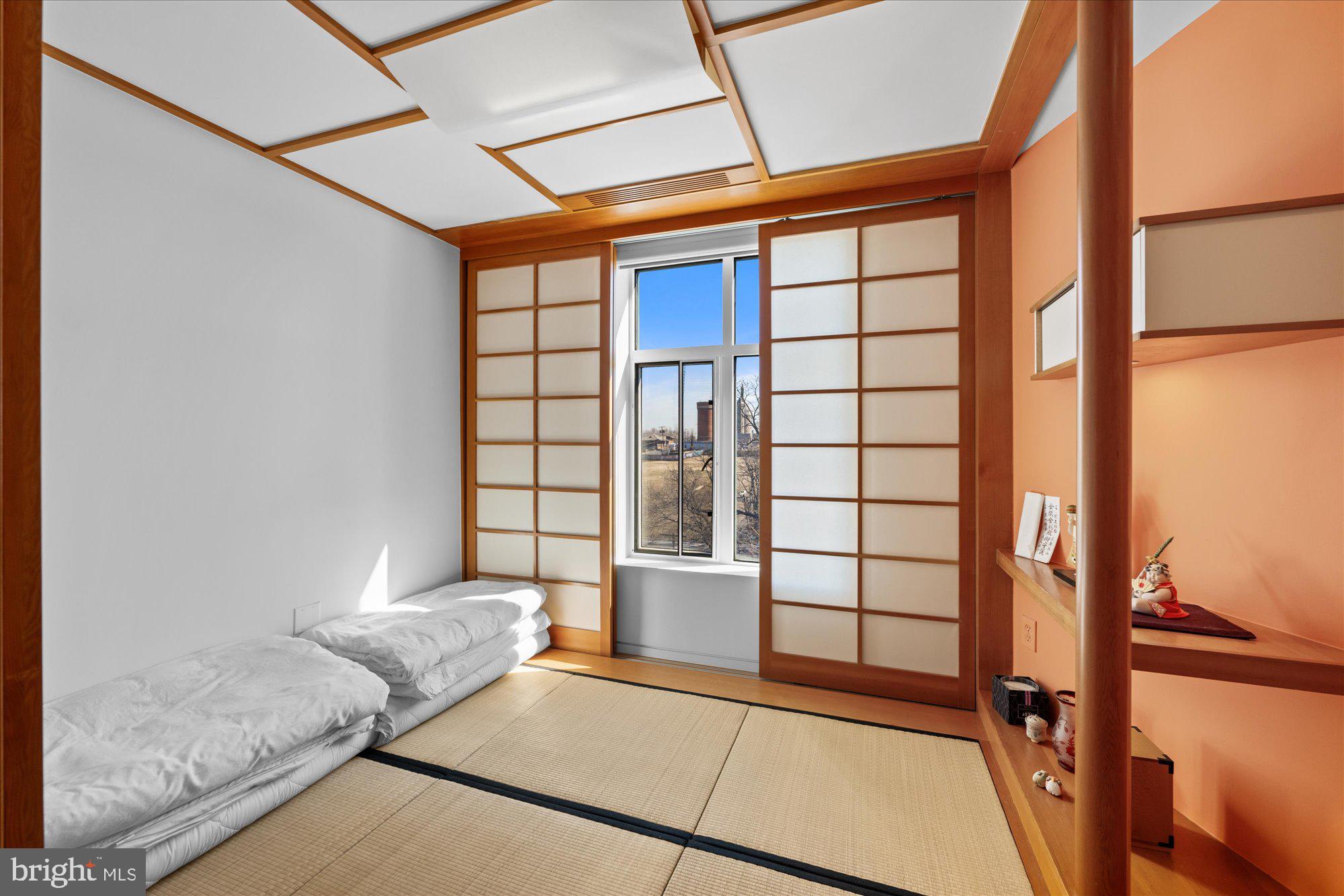 4750 41st Street Northwest, Unit 507 Washington, DC 20016 - Photo 36 of 55 a view of front door with furniture and a window
