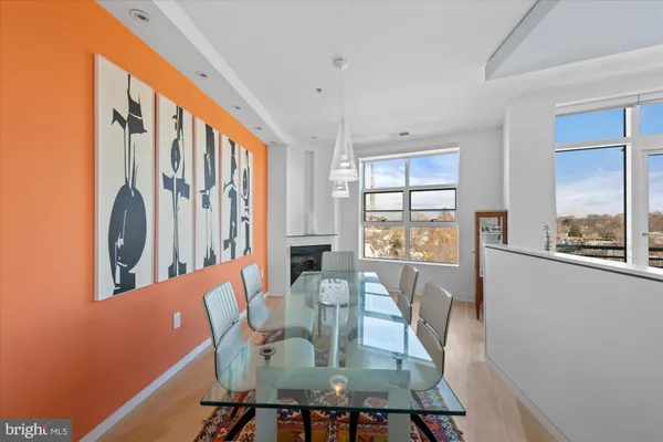 a view of a dining room with furniture window and outside view