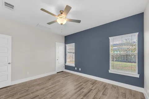 a bathroom with a sink a toilet and bathtub