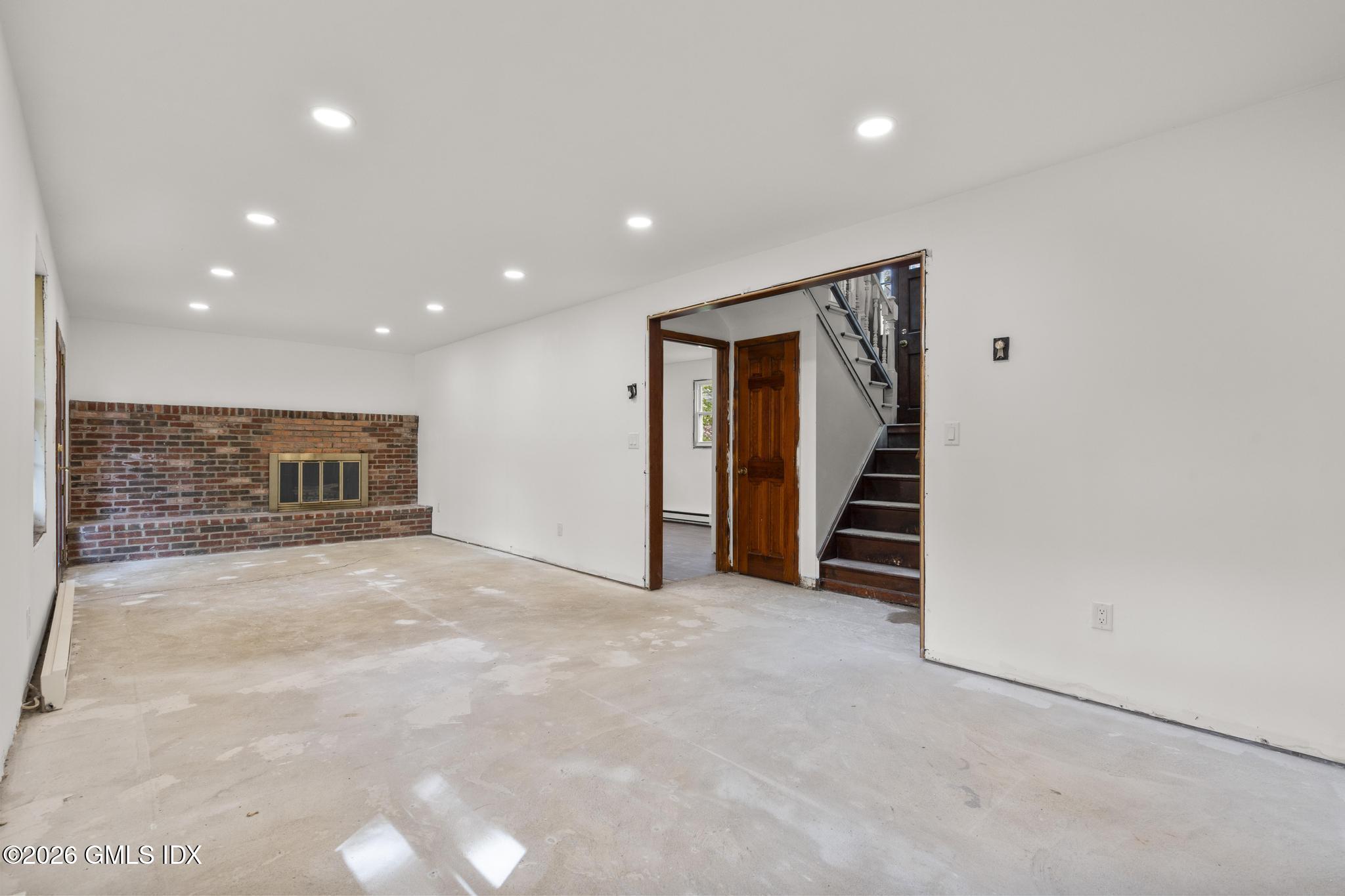 22 Carrona Drive Riverside, CT 06878 - Photo 9 of 26 a view of an empty room with wooden floor