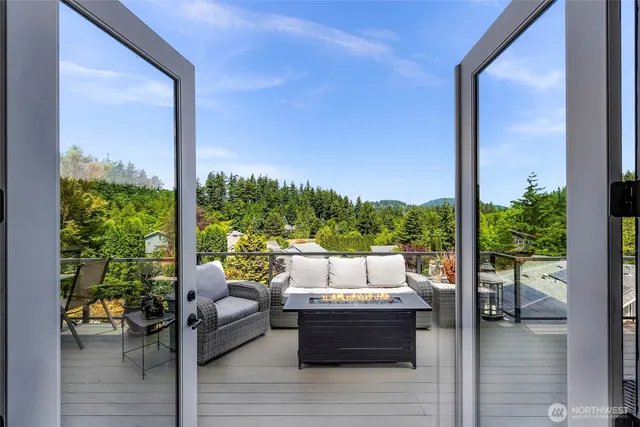 a room with patio outdoor seating and wooden floor