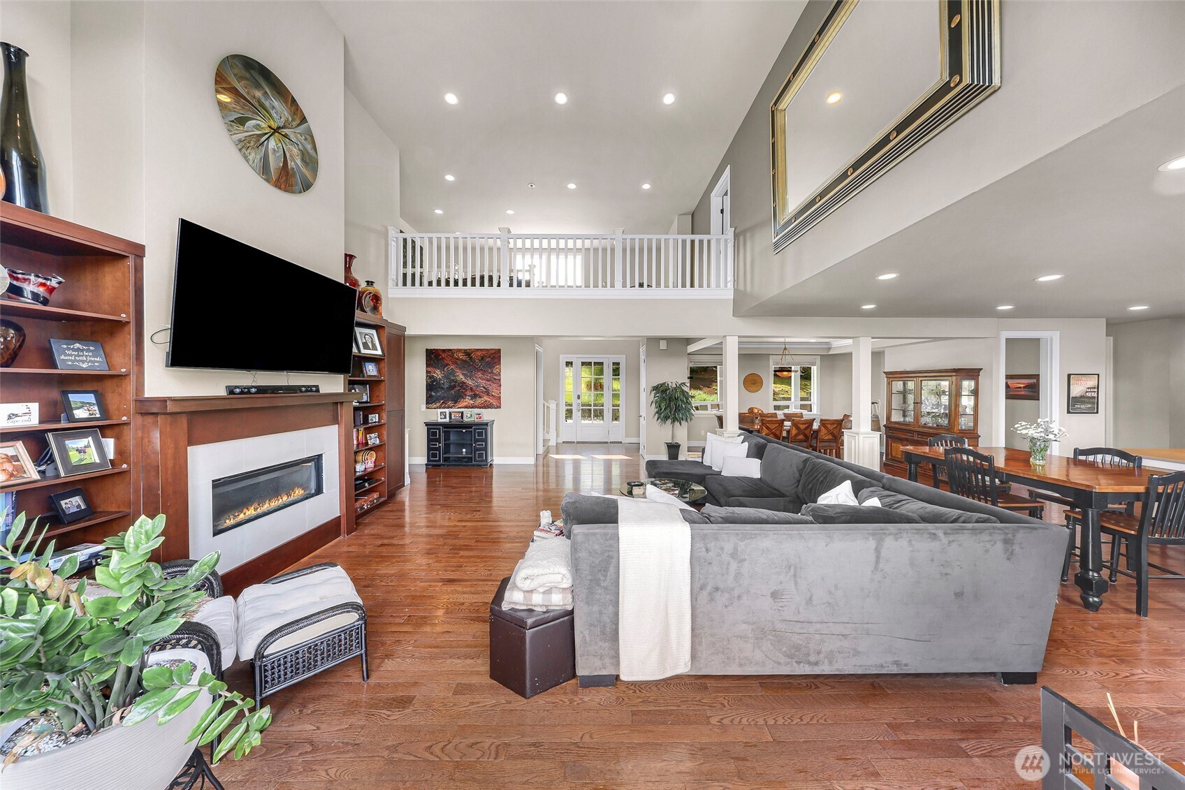 1301 Broad Street Bellingham, WA 98229 - Photo 11 of 40 a living room with fireplace furniture and a flat screen tv