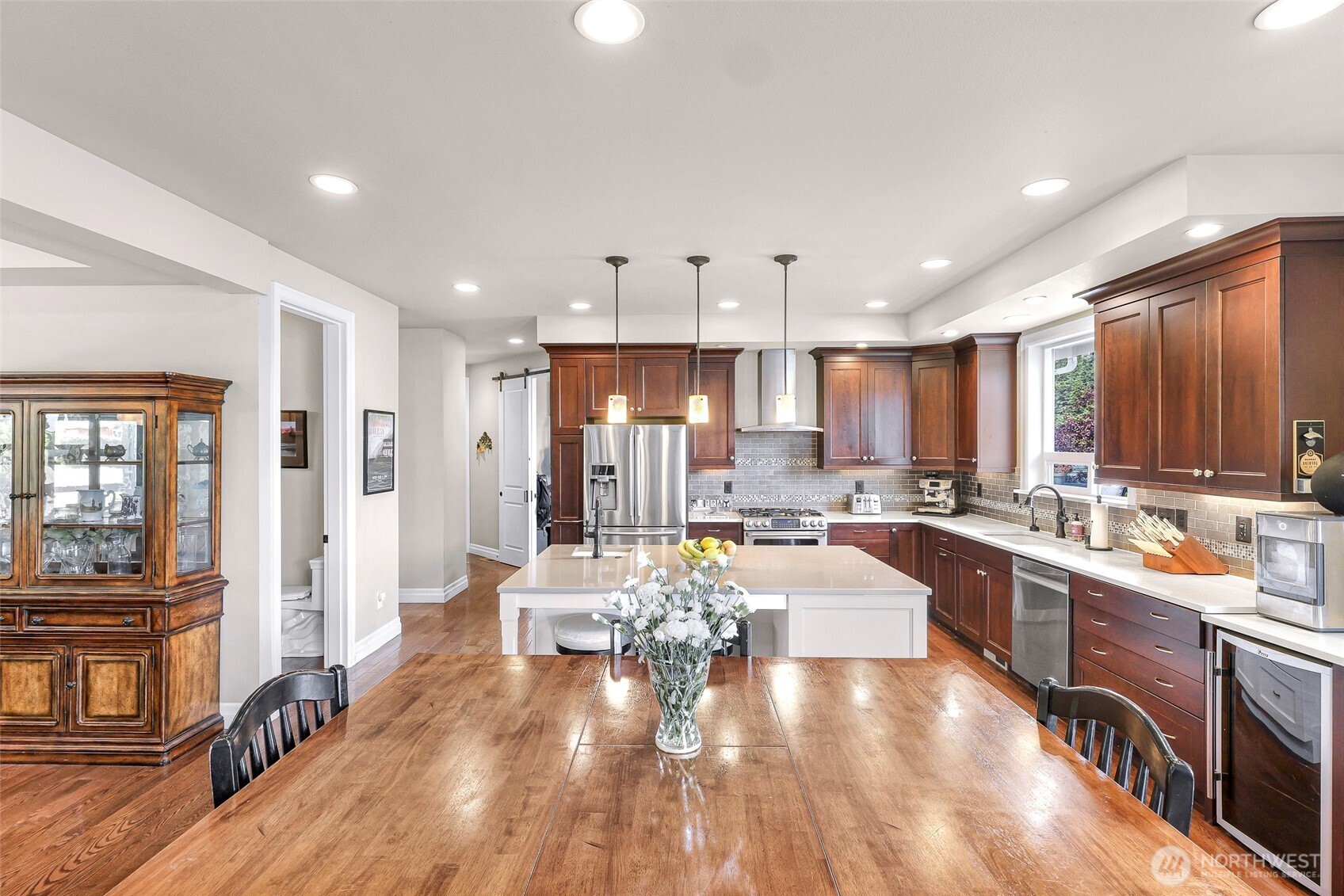 1301 Broad Street Bellingham, WA 98229 - Photo 13 of 40 a large kitchen with lots of counter top space a sink appliances and cabinets