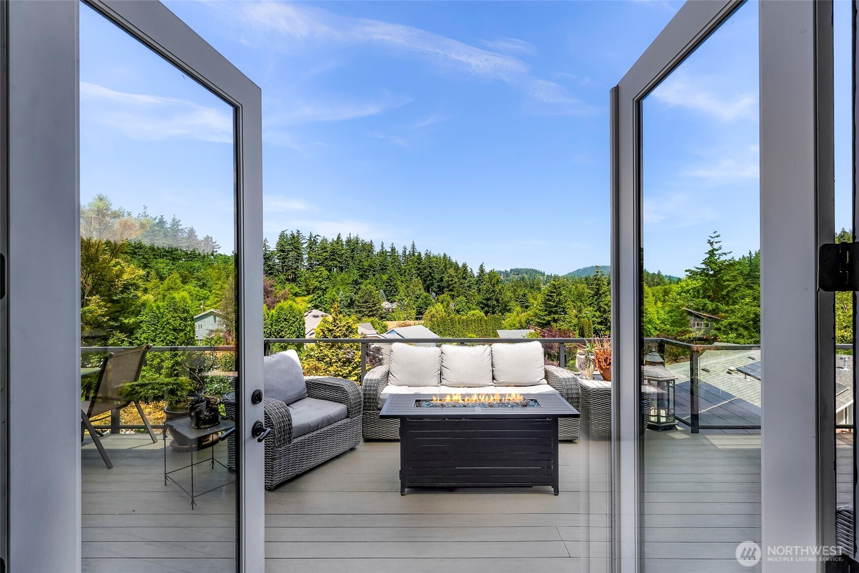 1301 Broad Street Bellingham, WA 98229 - Photo 2 of 40 a room with patio outdoor seating and wooden floor