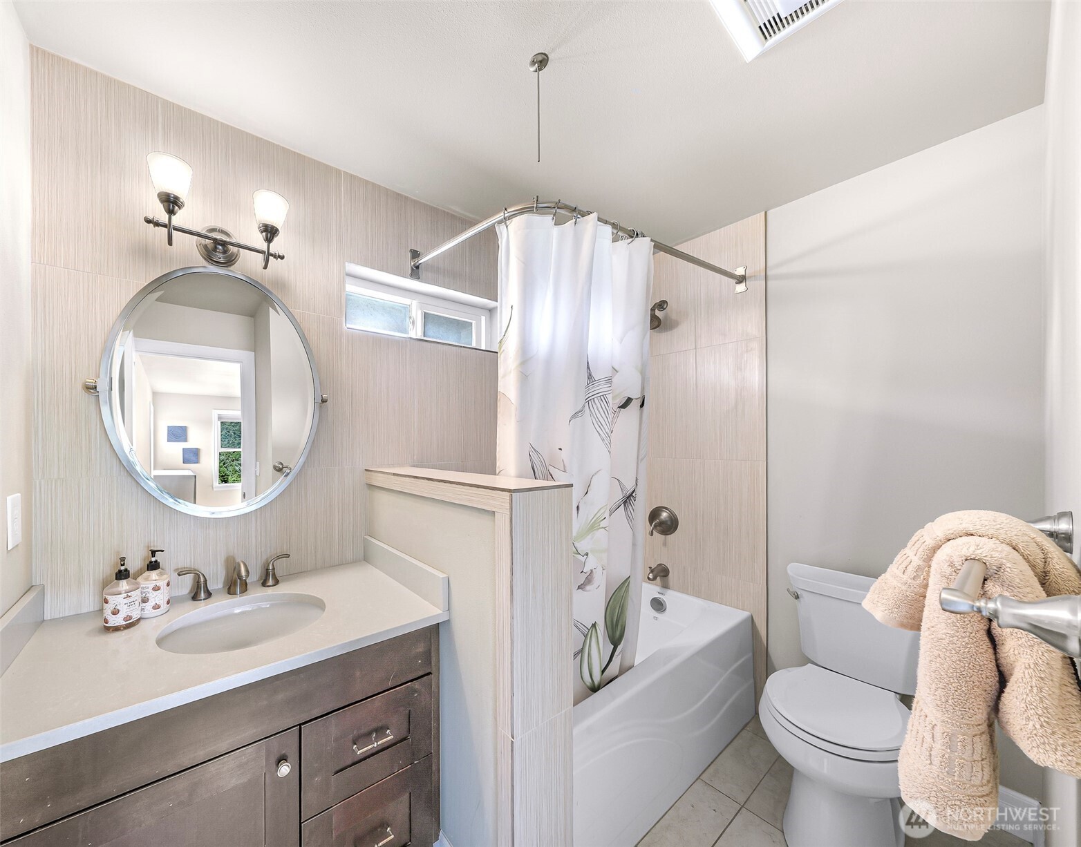 1301 Broad Street Bellingham, WA 98229 - Photo 28 of 40 a bathroom with a sink toilet and shower