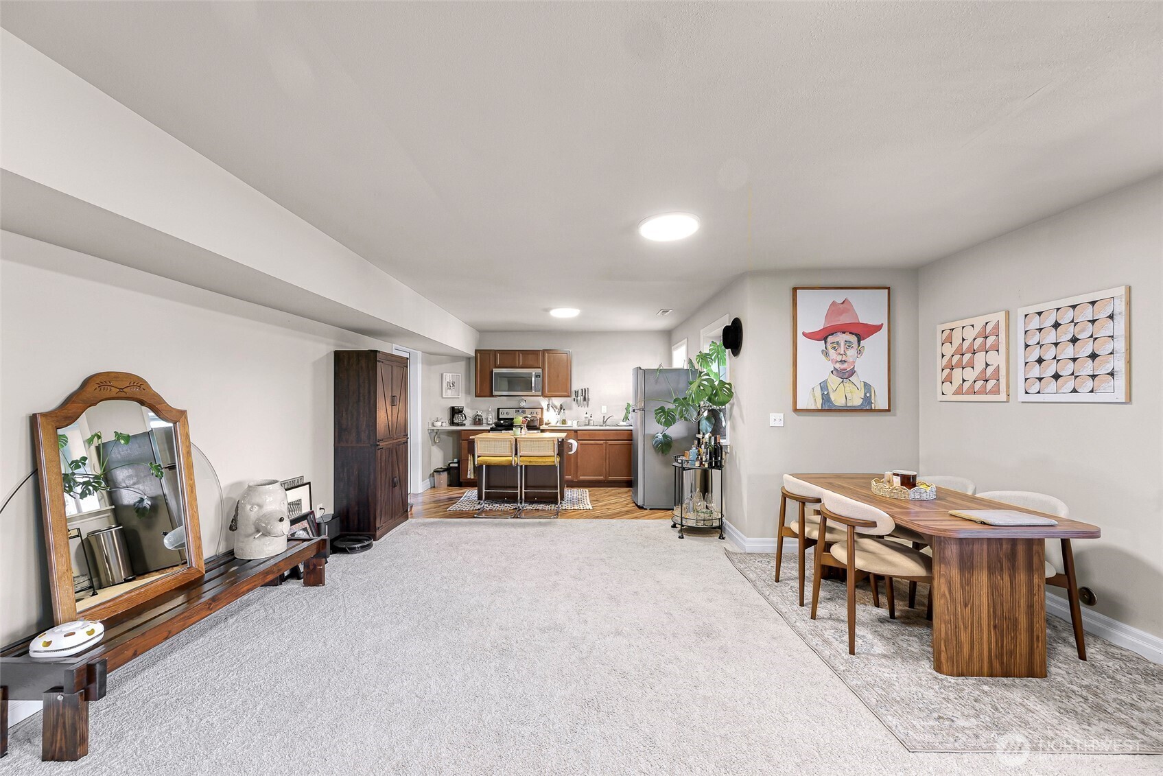 1301 Broad Street Bellingham, WA 98229 - Photo 34 of 40 a living room with furniture gym equipment and a fireplace