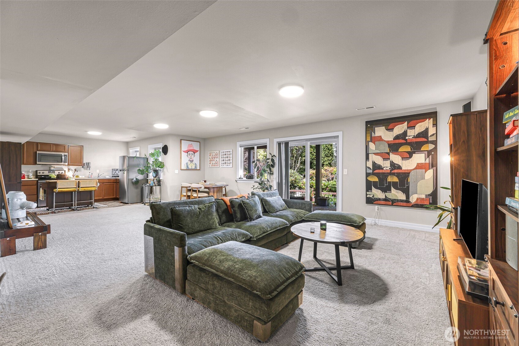 1301 Broad Street Bellingham, WA 98229 - Photo 35 of 40 a living room with furniture and a flat screen tv