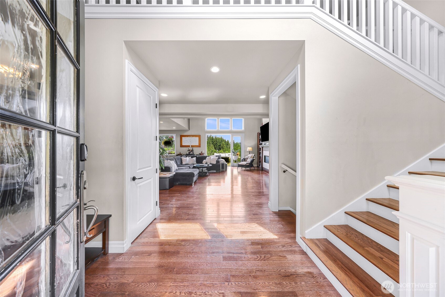 1301 Broad Street Bellingham, WA 98229 - Photo 7 of 40 a view of dining room with wooden floor and a rug
