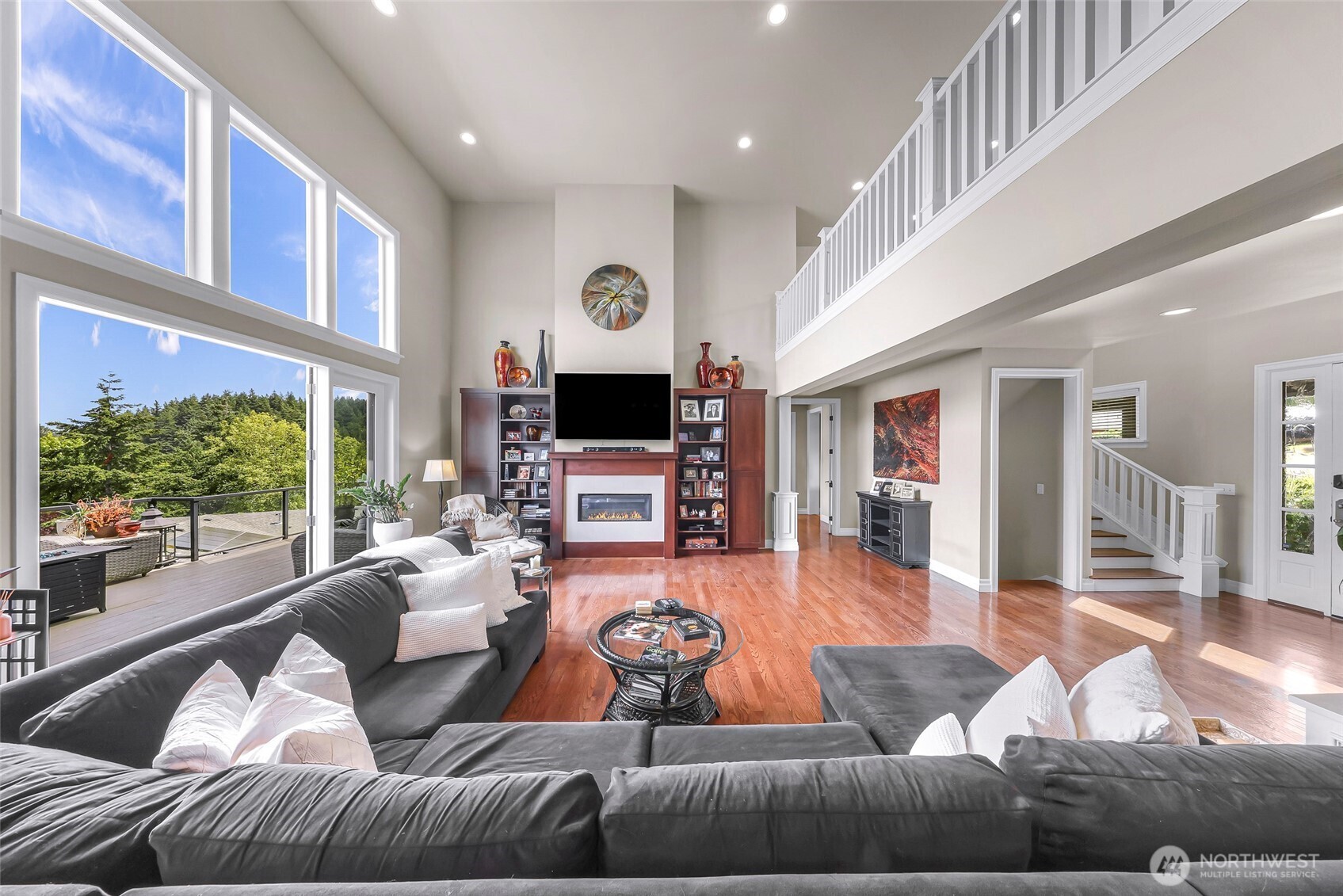 1301 Broad Street Bellingham, WA 98229 - Photo 10 of 40 a living room with furniture and a flat screen tv