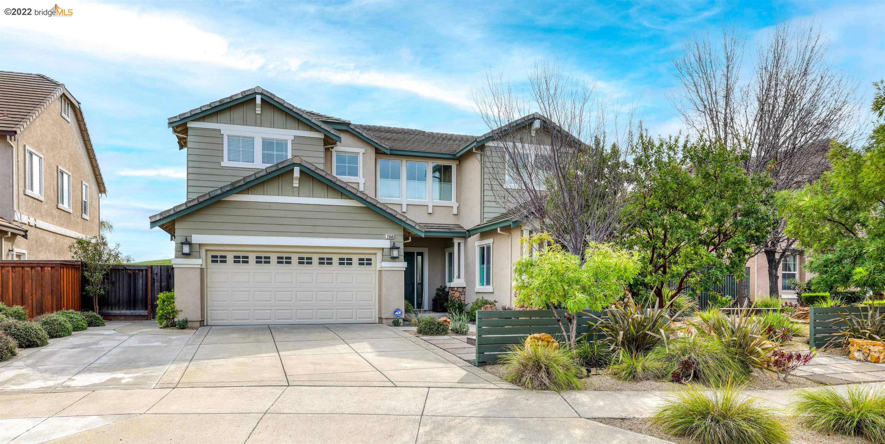 2560 Camel Back Road Brentwood, CA 94513 - Photo 1 of 1 a front view of a house with a yard and garage