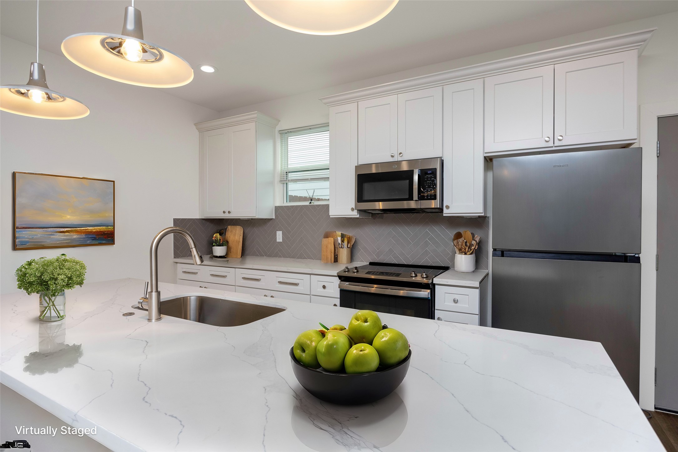 2753 Redrock Street, Unit B Houston, TX 77088 - Photo 16 of 35 a kitchen with stainless steel appliances a refrigerator sink and microwave