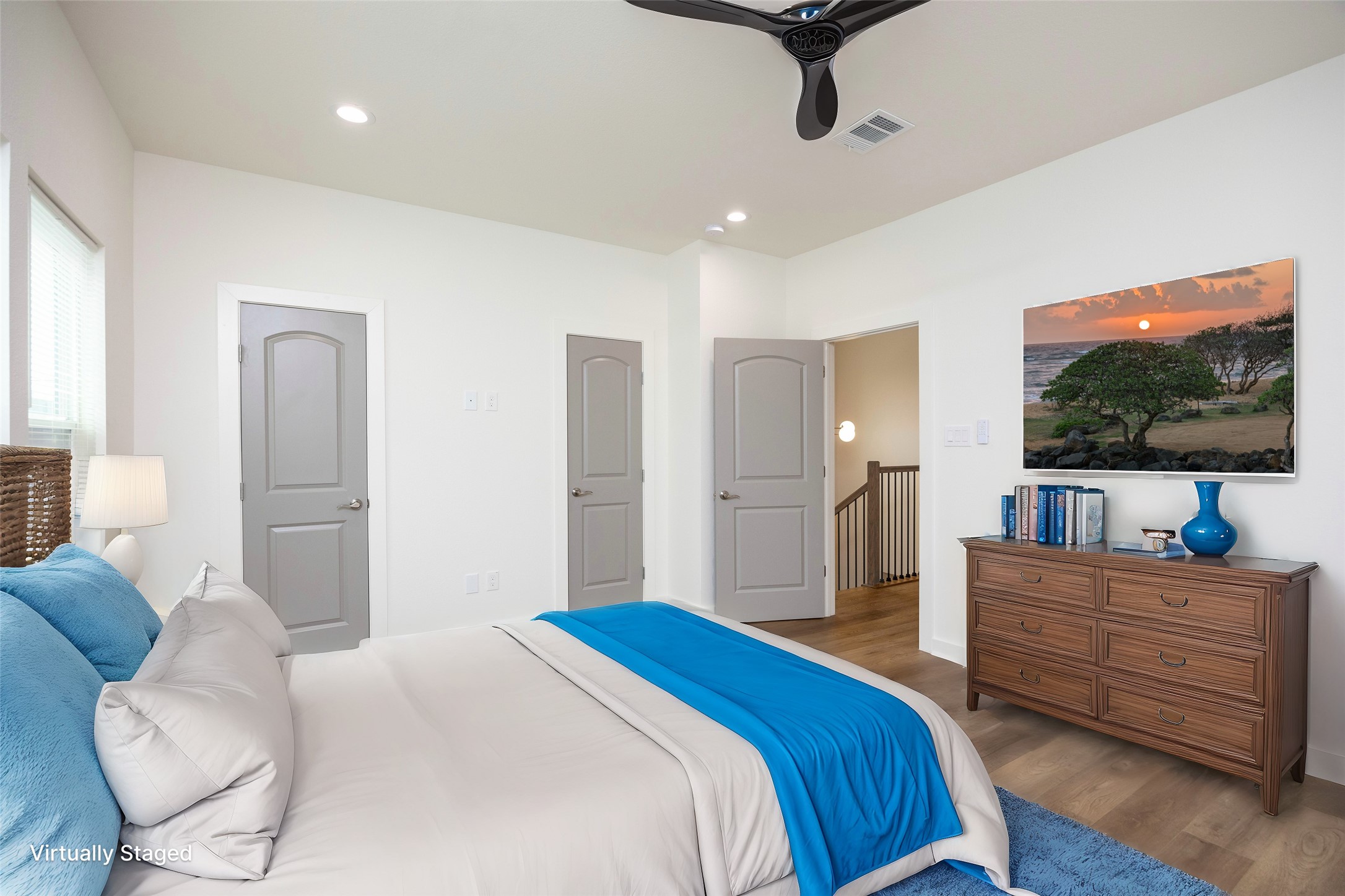2753 Redrock Street, Unit B Houston, TX 77088 - Photo 25 of 35 a bedroom with a bed and a flat screen tv