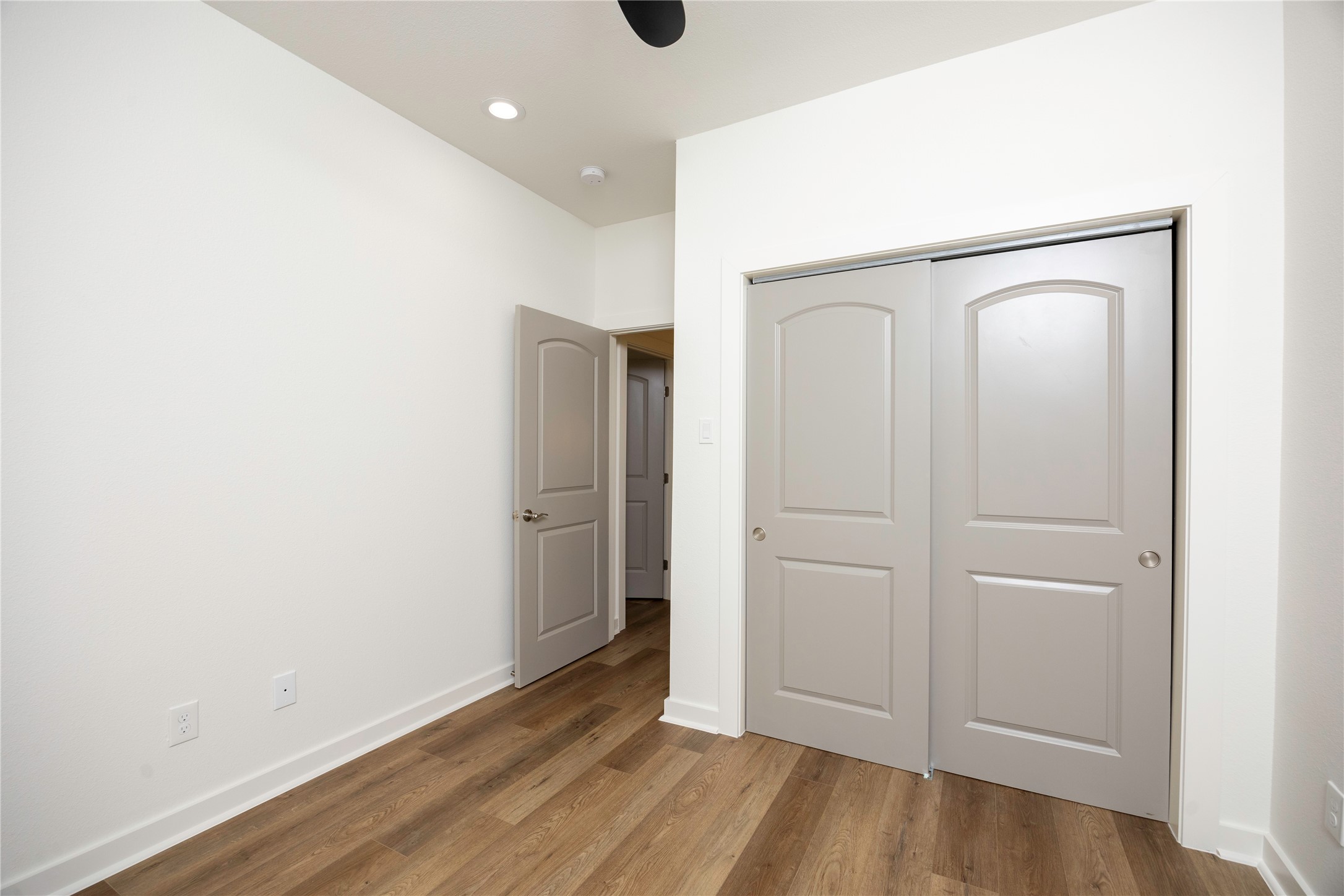2753 Redrock Street, Unit B Houston, TX 77088 - Photo 34 of 35 a view of an empty room with wooden floor