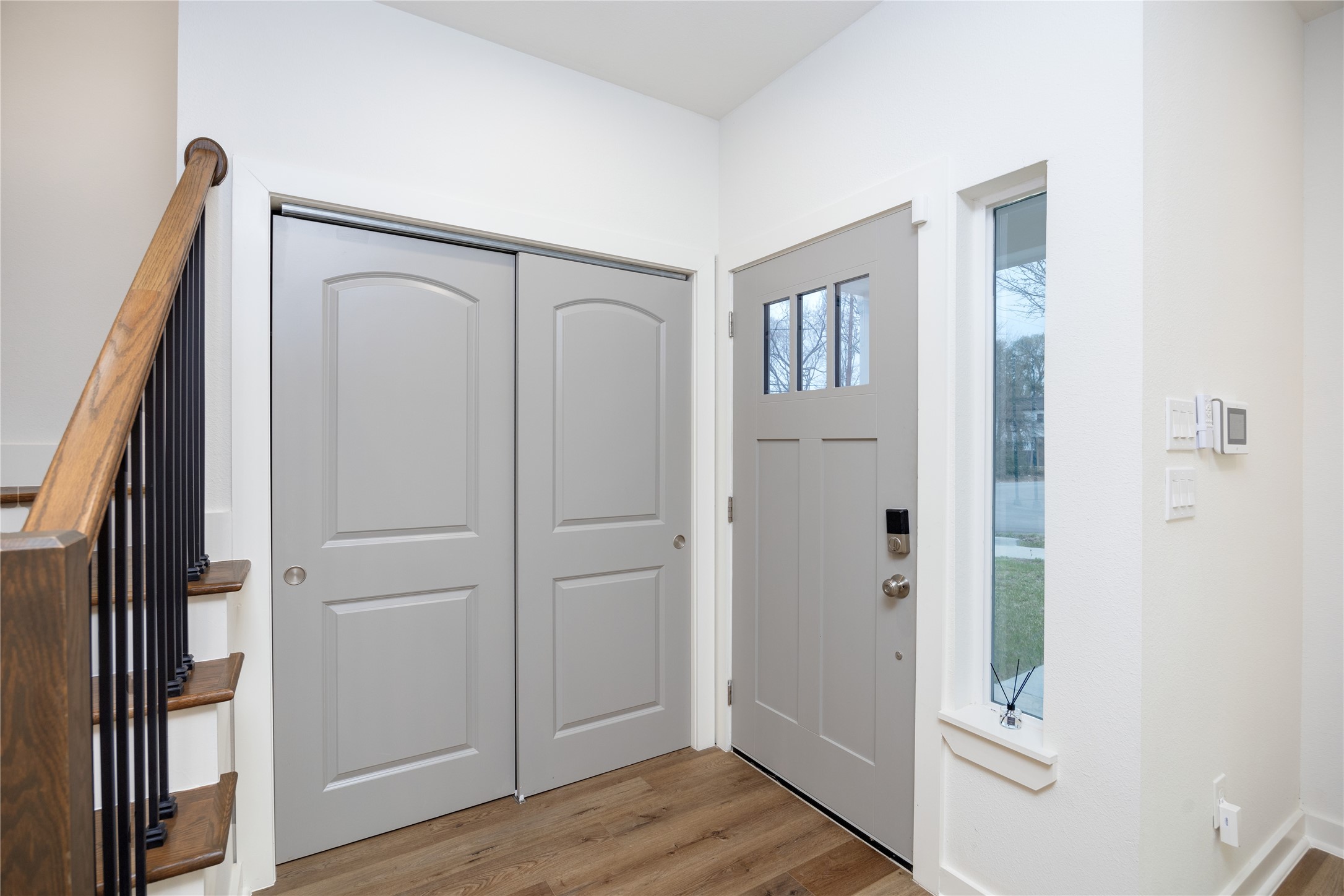 2753 Redrock Street, Unit B Houston, TX 77088 - Photo 6 of 35 a view of a hallway with wooden floor and entryway