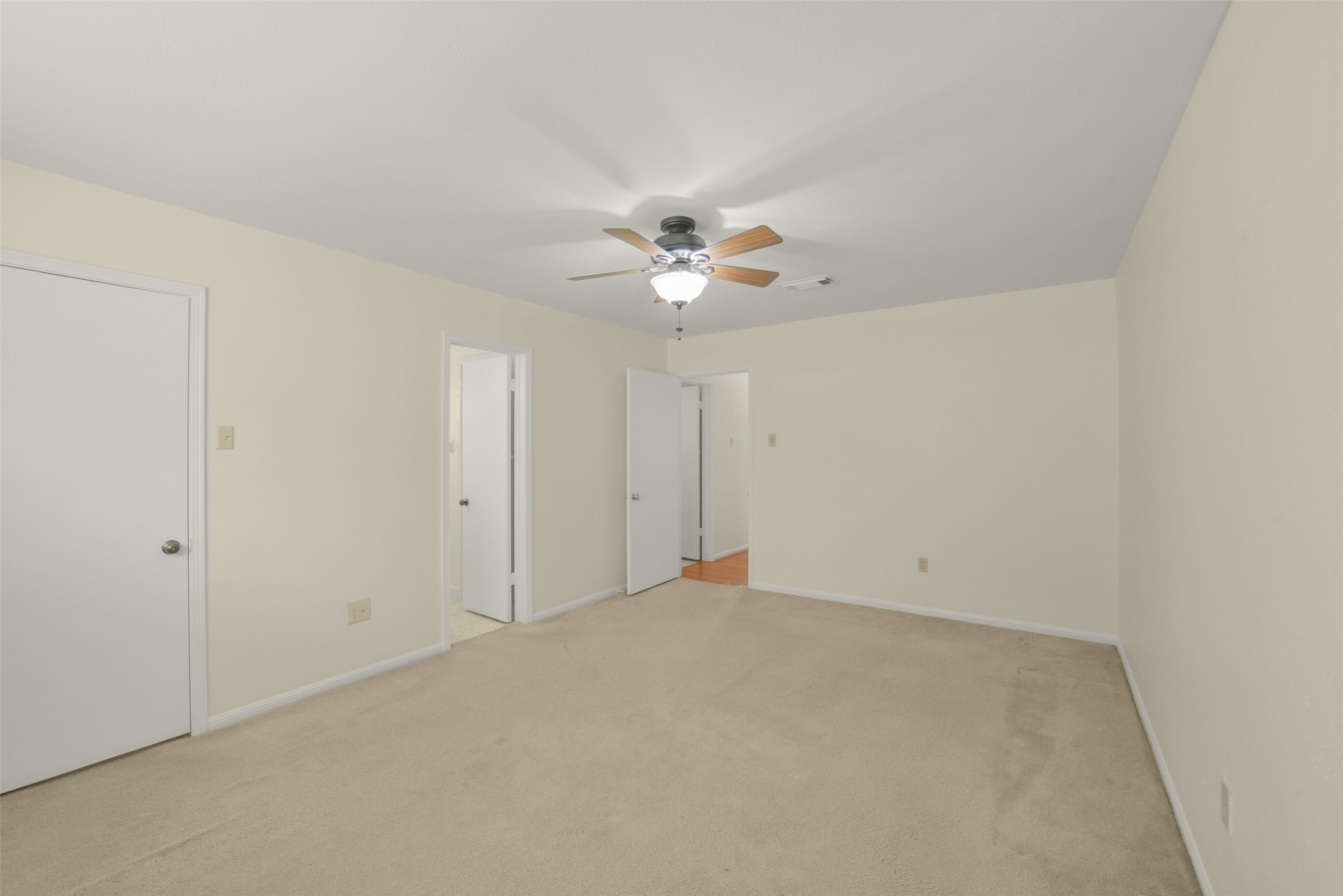7818 Kleingreen Lane Spring, TX 77379 - Photo 35 of 50 an empty room with fan and a ceiling fan