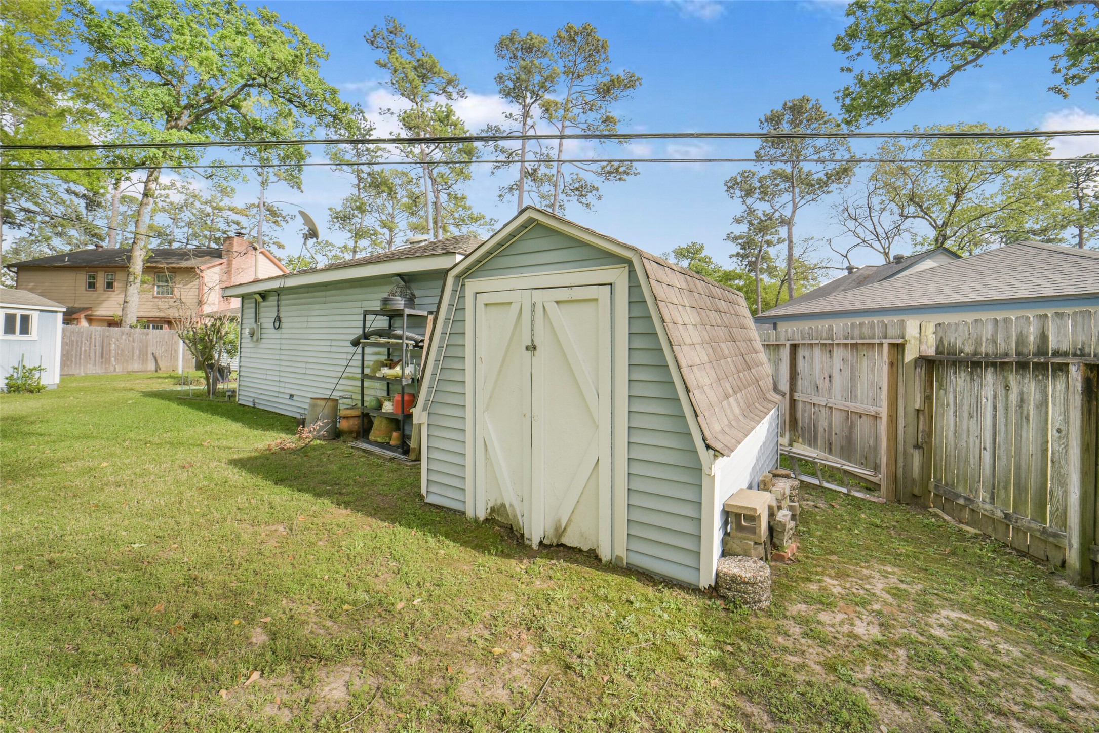 7818 Kleingreen Lane Spring, TX 77379 - Photo 43 of 50 a view of a small house with a yard